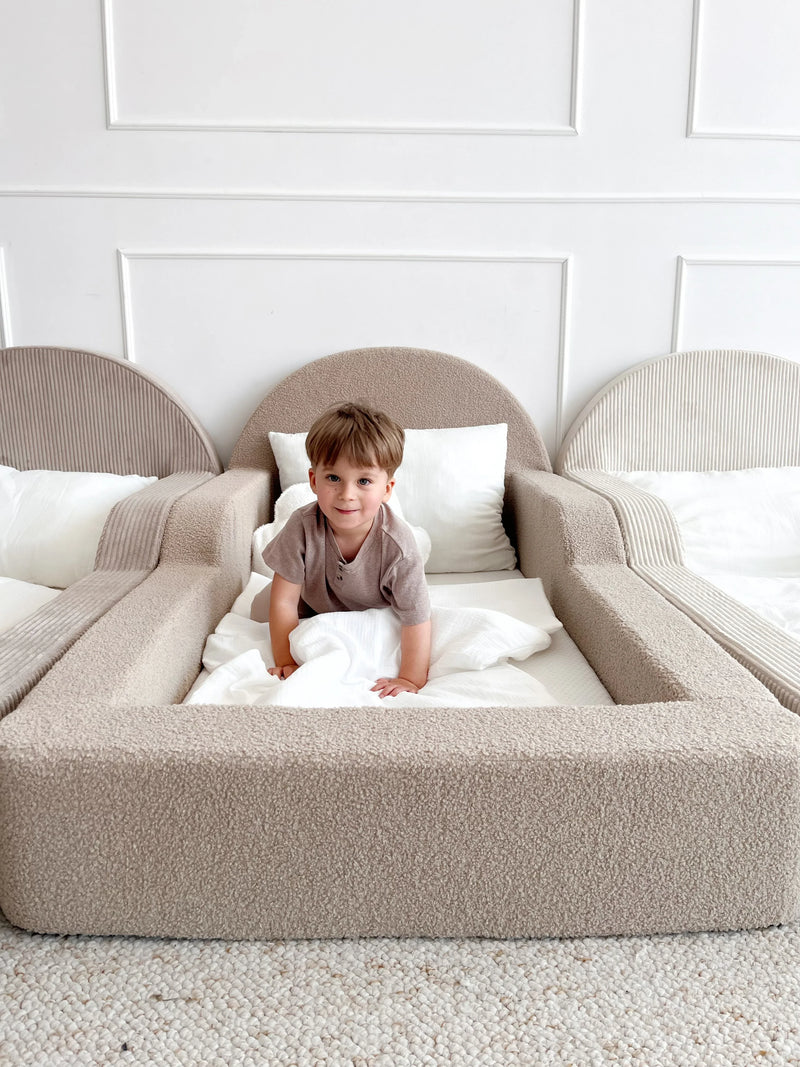 Soft foam Montessori beds for toddlers in bouclé and corduroy by Monio